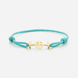 Challenge cord bracelet Aqua Blue in 9kt Yellow gold